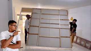 Ingenioso trabajo hecho a mano usando paneles de yeso en una pared con decoración Led
