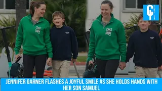 Jennifer Garner flashes a joyful smile as she holds hands with her son Samuel