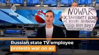 ‘They’re lying to you’: Russian state TV employee protests on air