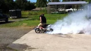 Pit bike 4th gear burnout tire pop