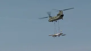Iowa NG CH 47 delivers historic Iowa F 80 back to Camp Dodge via sling load