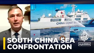 China accused of using water cannon on Philippine boat in South China Sea