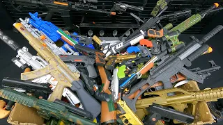 Toy Guns and Dangerous Ordnance Equipment. Box of Toy Guns