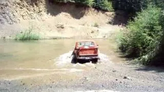 1977 Ford driving through some water