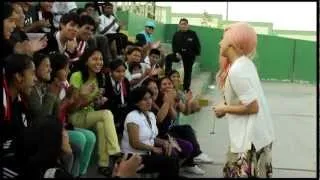 Lady Gaga surprises Peruvian children with a school visit