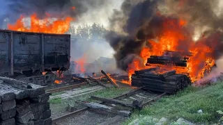 Railroad car engulfed in flames after shelling in Lyman, Ukraine | AFP