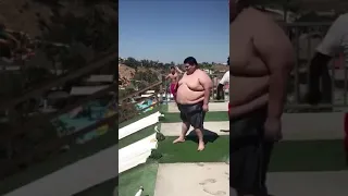 Fat kid water slide mega belly flop.