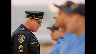 Oklahoma City police officers inspect new recruits