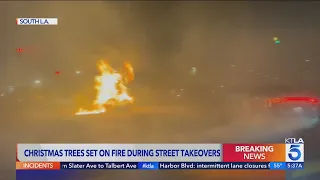 Christmas trees set on fire during street takeover