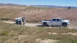 setting up to right the dump truck