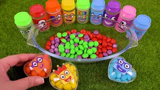 Satisfying video | Glossy bathtub full of M&M's with rainbow heart Skittles candy cutting ASMR