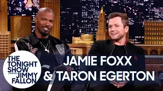 Jamie Foxx & Taron Egerton Talk About Robin Hood