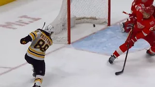 Bruins' Marchand makes great pass though heavy traffic to set up Pastrnak goal