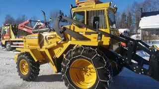 Snöskottning med baklastare