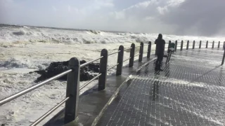 Keep your distance when filming storm waves