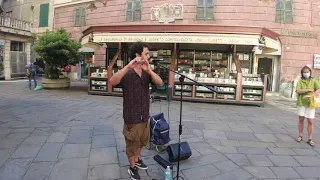 Amazing Flute Busker Performs in the streets of Italy