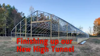 Finishing up our New High Tunnel  -  Greenhouse Build Part 4 - Wirelock Track and Wood