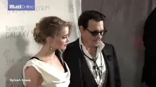 Johnny Depp & Amber Heard hand in hand...