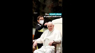 Young boy tries to take Pope Francis’ papal cap in Vatican