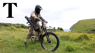 British soldiers train on e-bikes while carrying anti-tank weapons