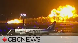 Video captures fiery crash between passenger plane and Japanese coast guard aircraft