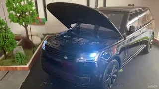 Range rover in 1/18 scale from QYtoys customized to full black line.