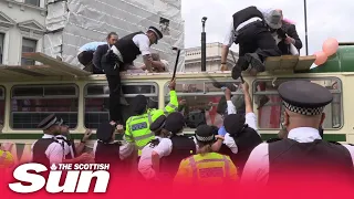 Police using batons accused of heavy-handed tactics at Extinction Rebellion protest