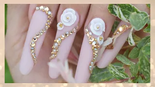 Stunning modern almond nails | crystal swirls | 3D flowers