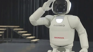 Asimo robot runs, hops and uses sign language