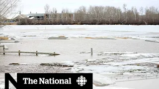 Fort McMurray flooding forces evacuation, call for military assistance