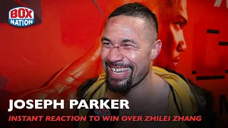 Joseph Parker REACTS to SURVIVING TWO KNOCKDOWNS & still beating Zhilei Zhang by majority decision