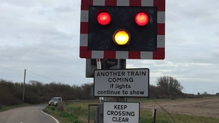 Two Miniature Trains at Botolphs Bridge Level Crossing, Kent