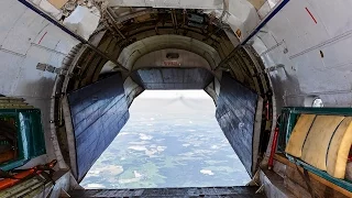 Antonov 12 - Ruby Star | open cargo door inflight over Belarus