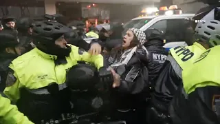 NYPD car responding to call about grenade in Uber stopped by swarm of protesters in Times Square