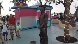 Living statue street performer at Ft Myers beach Florida.. March 30 2018