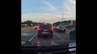 Car speeds down highway on 2 wheels