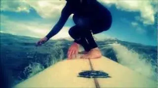 Longboard Surfing 3ft wave