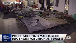 Poles turn shopping mall into shelter for Ukrainian refugees