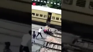 Narrow Escape! Man abandons bike moments before train runs it over