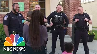 Officers Reunite With Family After Dramatic Fire Rescue Caught On Camera