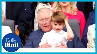 Cute moment Prince Charles bounces Prince Louis on his knee