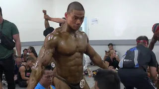 Thailand bodybuilder backstage tanning, 02