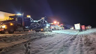 VOLVO JACKKNIFE IN SNOW STORM!! HEAVY DUTY RECOVERY