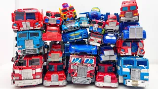 New TRANSFORMERS Car Park: OPTIMUS PRIME Assemble (Animated) TRANSPORTING Autobots Tobot Car Toys