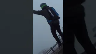 foggy BASE jump - jumping into unknown