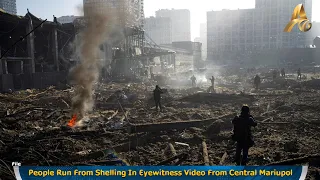 People Run From Shelling In Eyewitness Video From Central Mariupol