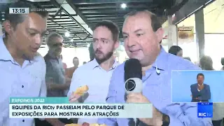 Equipes da RICtv passeiam pelo parque de exposições para mostrar atrações