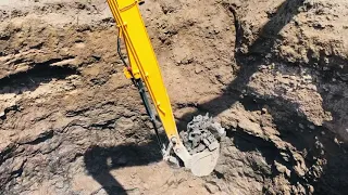 50ft well digging by Hyundai R-215 19Mtr long boom