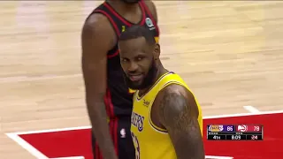 Refs stop the game after a Hawks fan heckles LeBron