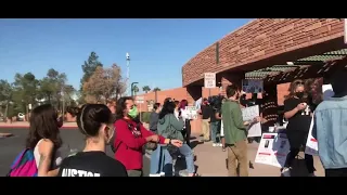 Protesters rally outside of Clark County Government Center right now